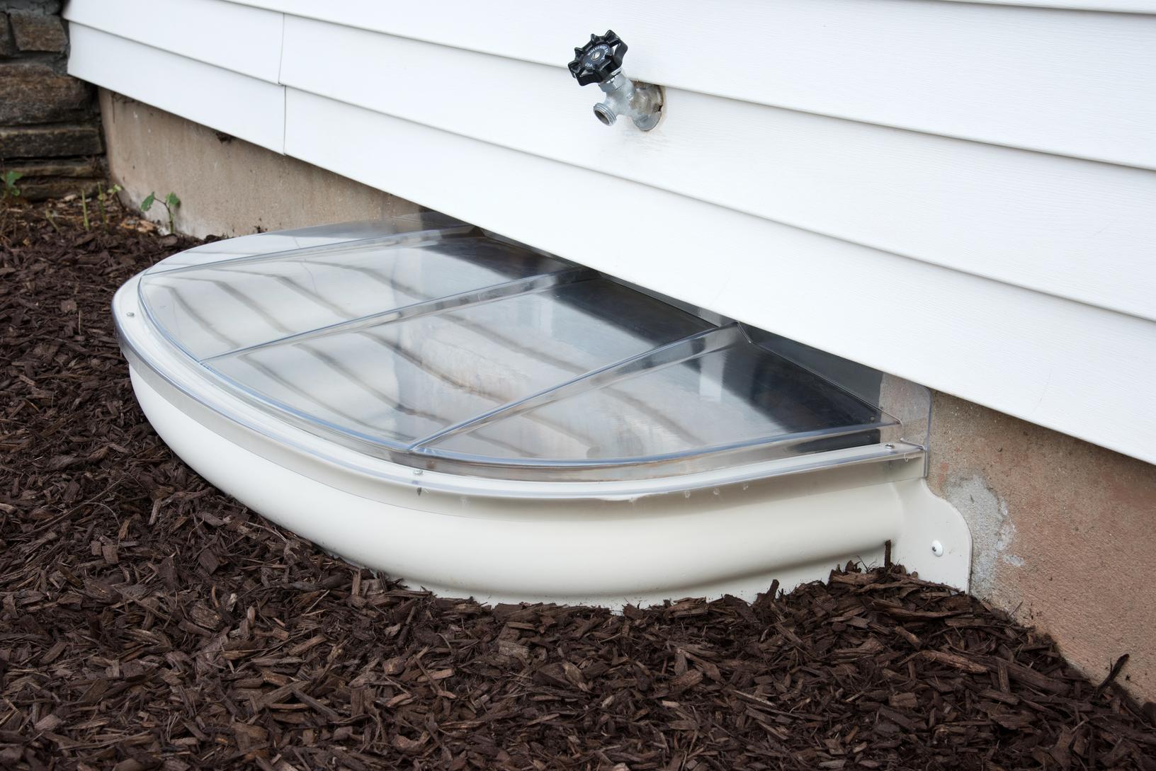 basement egress window well in Falconer