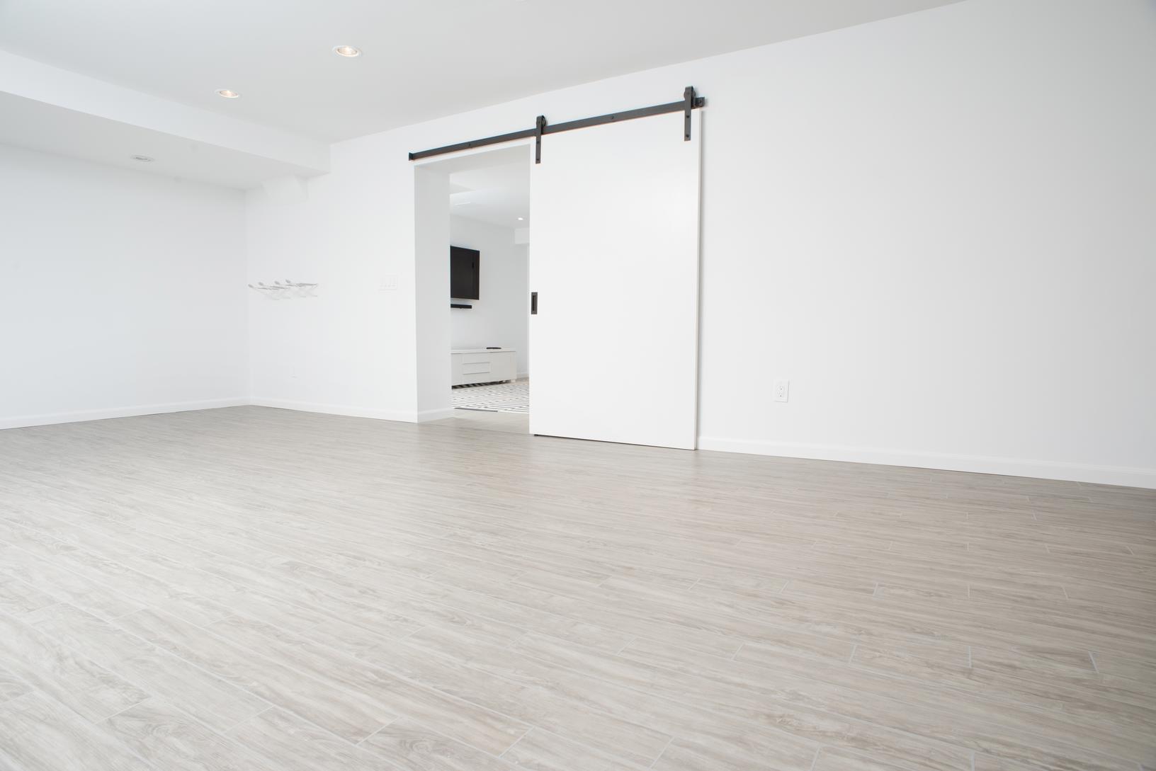 Basement wood-like plank flooring