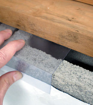 Block wall clear covering for wet crawl spaces in Russell
