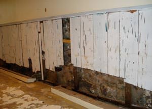 A wet, flooded finished basement in Youngsville