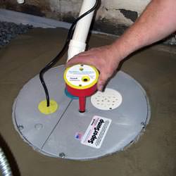 A newly installed sump pump system in a basement in Waterford