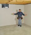 Titusville basement insulation covered by EverLast™ wall paneling, with SilverGlo™ insulation underneath