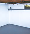 Meadville, PA & NY wet basement wall covering that tucks into a perimeter drainage system
